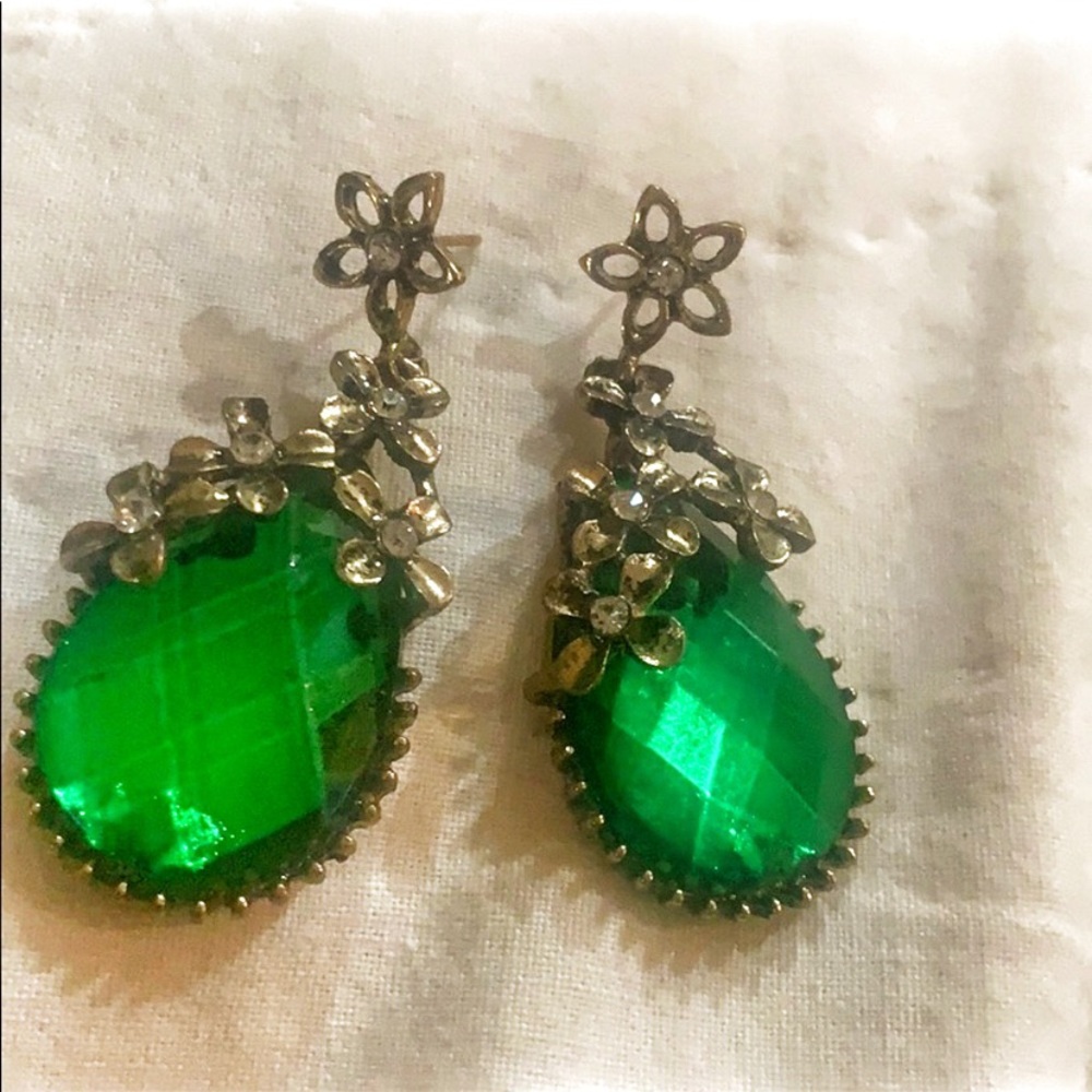 Green fashion earrings with floral adornments
